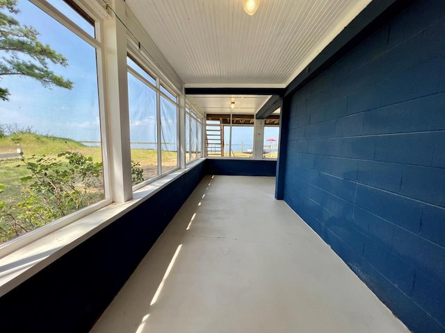 59 Judith Sound Cir, Lottsburg, VA 22511 - unfurnished sunroom featuring finished concrete floors and concrete block wall