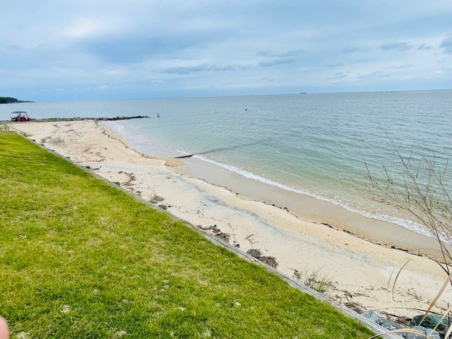 view of water feature with a beach view