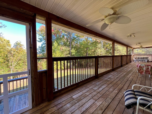 wooden terrace with ceiling fan