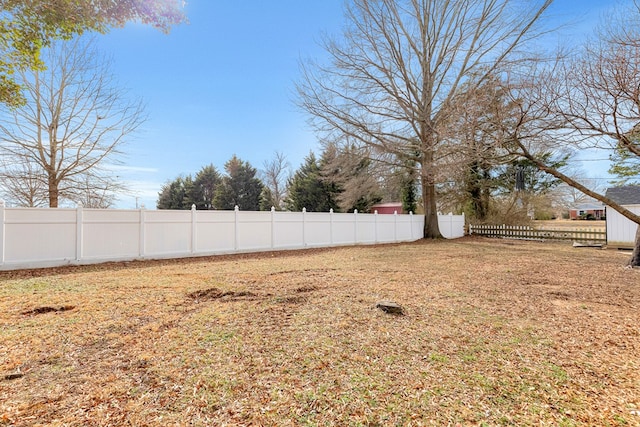 view of yard with fence