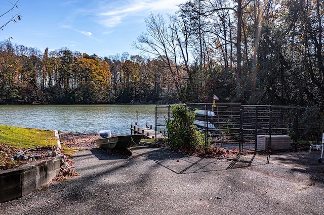 view of patio with a water view