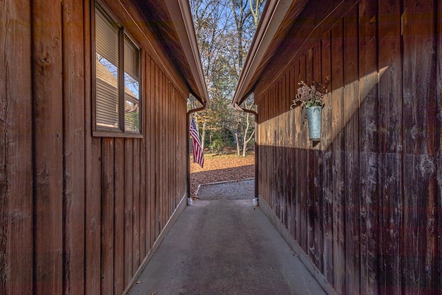 view of side of home with a patio area