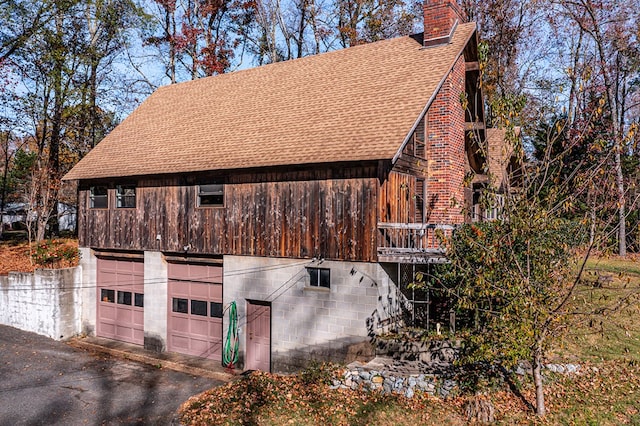 view of home's exterior featuring a garage