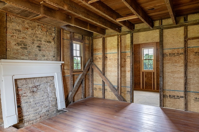 2274 Menokin Rd, Warsaw, VA 22572 - unfurnished living room with healthy amount of natural light, wood-type flooring, and wooden ceiling