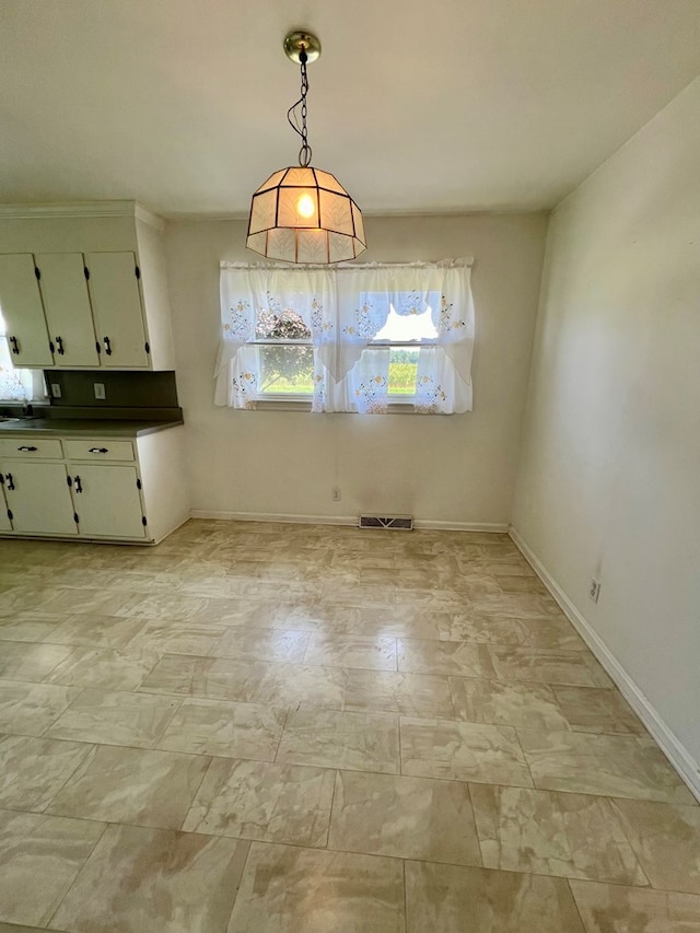 view of unfurnished dining area