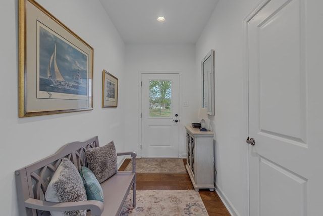 doorway to outside featuring dark hardwood / wood-style flooring