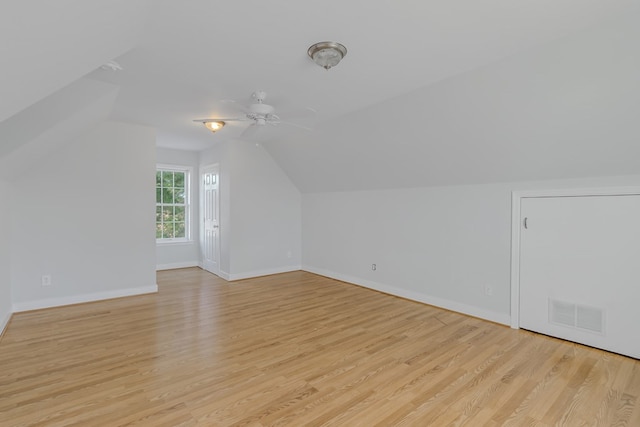 bonus room with ceiling fan, vaulted ceiling, and light hardwood / wood-style flooring