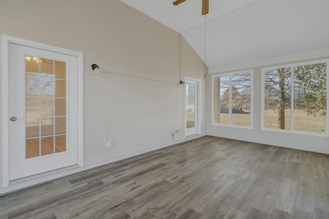 unfurnished sunroom featuring lofted ceiling and ceiling fan