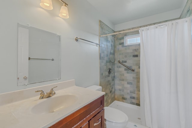 bathroom with toilet, curtained shower, and vanity