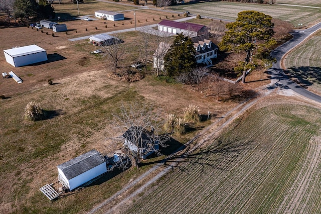 birds eye view of property featuring a rural view