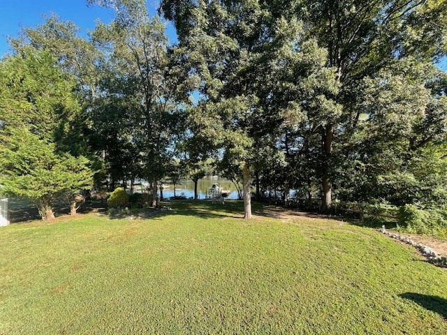 view of yard with a water view