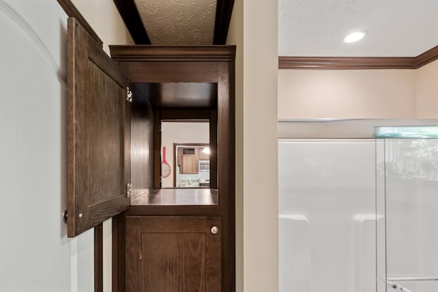 interior space with crown molding