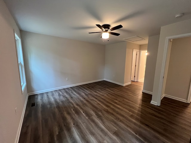 605 Shorewood Dr, Colonial Beach, VA 22443 - unfurnished room with a ceiling fan, dark wood-style flooring, baseboards, and a smoke detector
