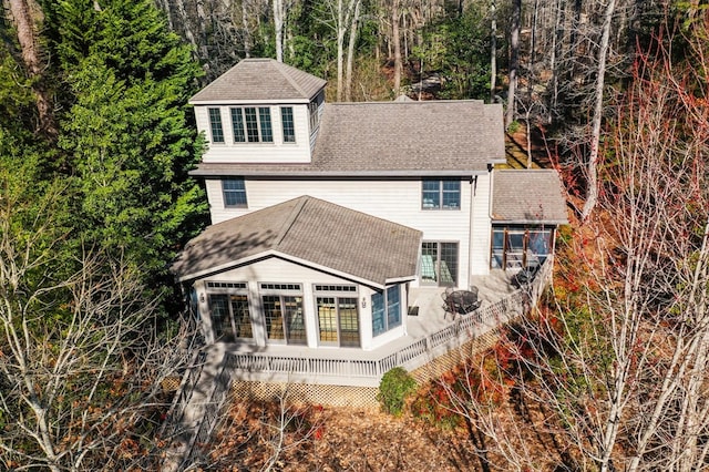 341 Pine Reach Dr, Kilmarnock, VA 22482 - back of property with a sunroom and roof with shingles