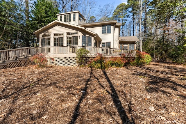 341 Pine Reach Dr, Kilmarnock, VA 22482 - back of property featuring a sunroom and a deck