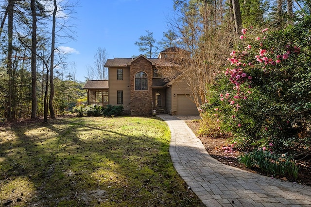 341 Pine Reach Dr, Kilmarnock, VA 22482 - traditional-style house with a front yard and stone siding