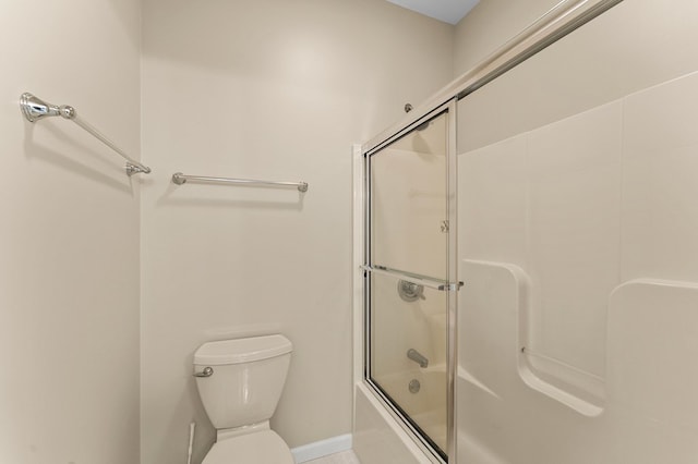 341 Pine Reach Dr, Kilmarnock, VA 22482 - full bathroom featuring toilet, shower / bath combination with glass door, and baseboards