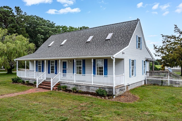 15 Surry St, Ophelia, VA 22473 - view of front facade with a porch, roof with shingles, and a front yard