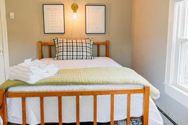 bedroom featuring a baseboard radiator