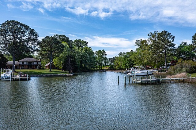 view of dock with a water view