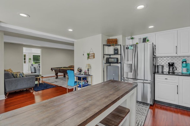 kitchen featuring white cabinetry, dark hardwood / wood-style flooring, stainless steel refrigerator with ice dispenser, and billiards