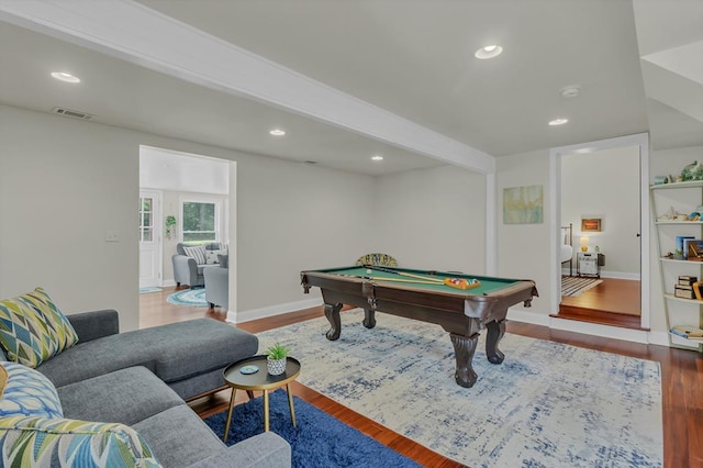 game room featuring wood-type flooring, beam ceiling, and billiards