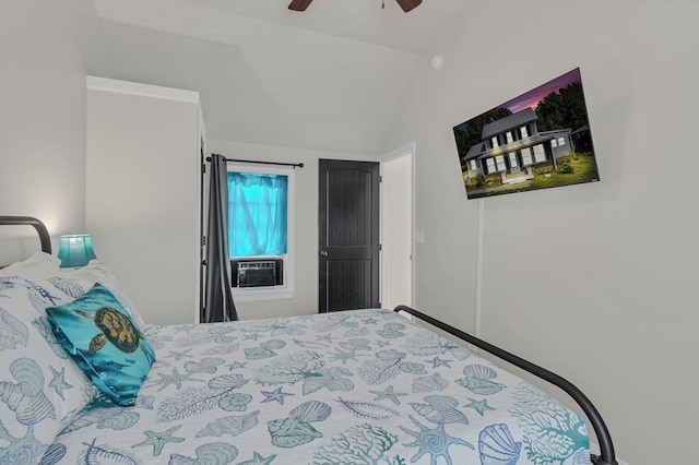 bedroom featuring ceiling fan and lofted ceiling