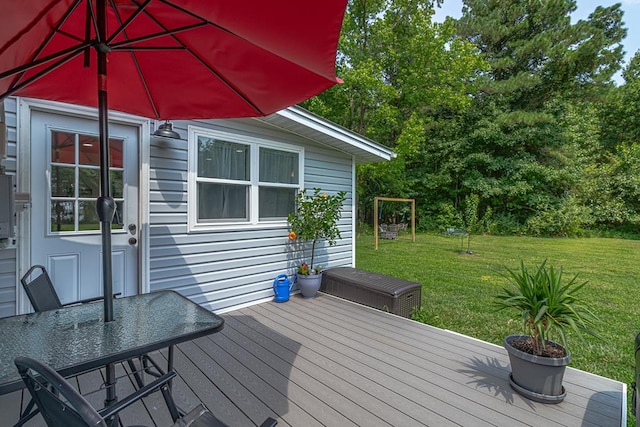 wooden deck with a yard