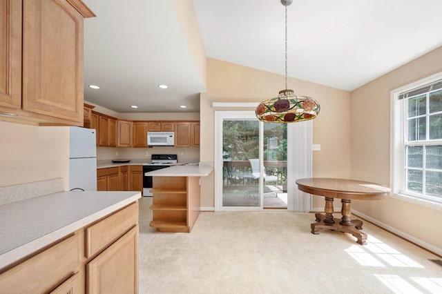 kitchen with plenty of natural light, light brown cabinets, white appliances, and hanging light fixtures