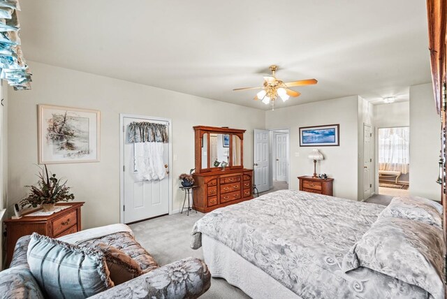 1753 N Independence Dr, Montross, VA 22520 - bedroom featuring light colored carpet, ceiling fan, and ensuite bath