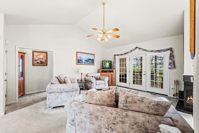 1753 N Independence Dr, Montross, VA 22520 - living room with carpet flooring, ceiling fan, baseboards, and high vaulted ceiling