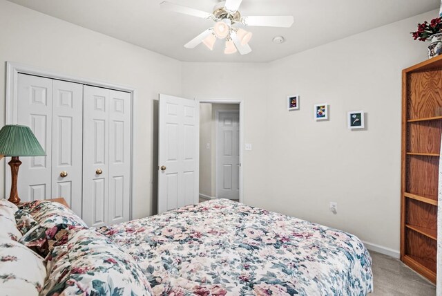 1753 N Independence Dr, Montross, VA 22520 - bedroom featuring light colored carpet, a closet, a ceiling fan, and baseboards