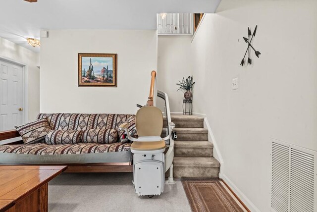 1753 N Independence Dr, Montross, VA 22520 - carpeted living room featuring stairs and baseboards