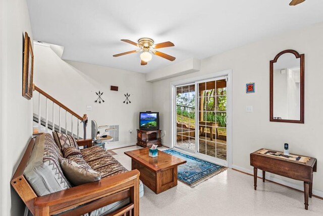 1753 N Independence Dr, Montross, VA 22520 - living area featuring a ceiling fan, baseboards, and stairway