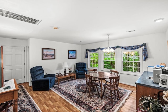 1753 N Independence Dr, Montross, VA 22520 - dining space featuring light wood-type flooring and a chandelier