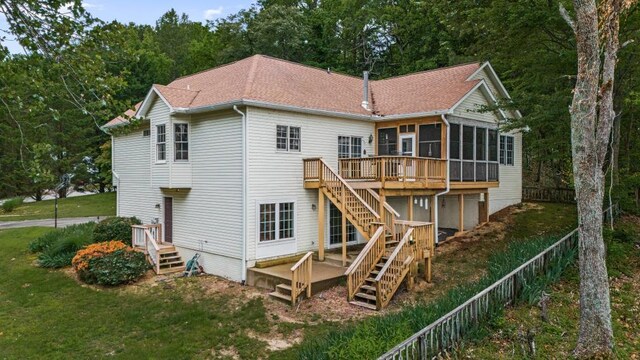 1753 N Independence Dr, Montross, VA 22520 - rear view of property featuring a sunroom, stairway, a deck, and roof with shingles