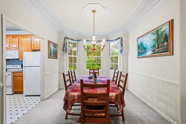 1753 N Independence Dr, Montross, VA 22520 - dining area with a chandelier, light colored carpet, baseboards, and ornamental molding