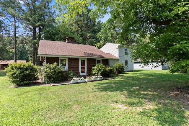 view of front facade featuring a front yard