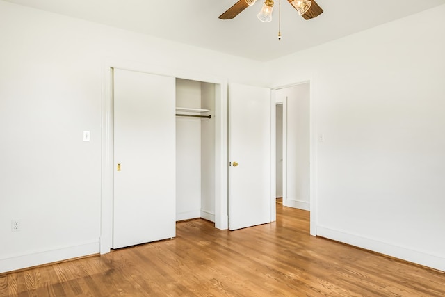 192 Morattico Rd, Lancaster, VA 22503 - unfurnished bedroom with light wood-style floors, a closet, and a ceiling fan