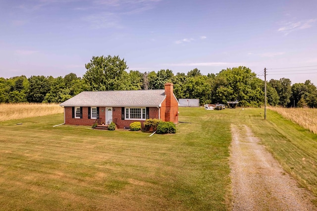 192 Morattico Rd, Lancaster, VA 22503 - single story home featuring dirt driveway, a front yard, brick siding, and a chimney