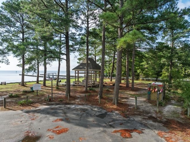 view of home's community featuring a gazebo and a water view