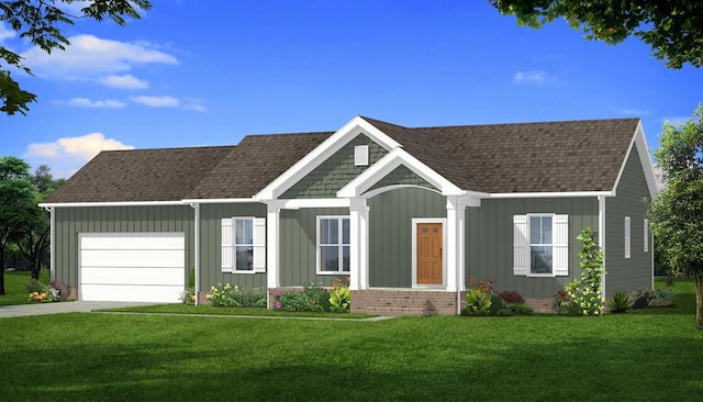 view of front of property featuring a front yard and a garage