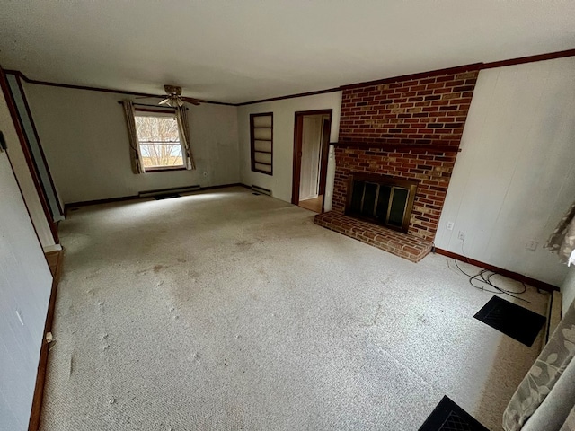 unfurnished living room with ceiling fan and a fireplace