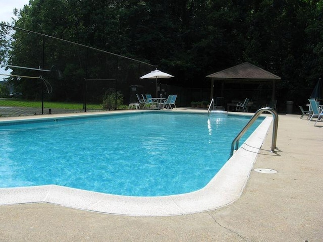309 Riverview Dr, Heathsville, VA 22473 - community pool featuring a patio area, a gazebo, and fence