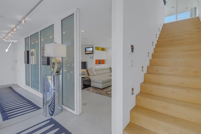 stairway with concrete floors