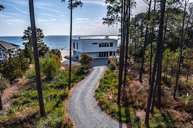 view of front of home featuring a water view