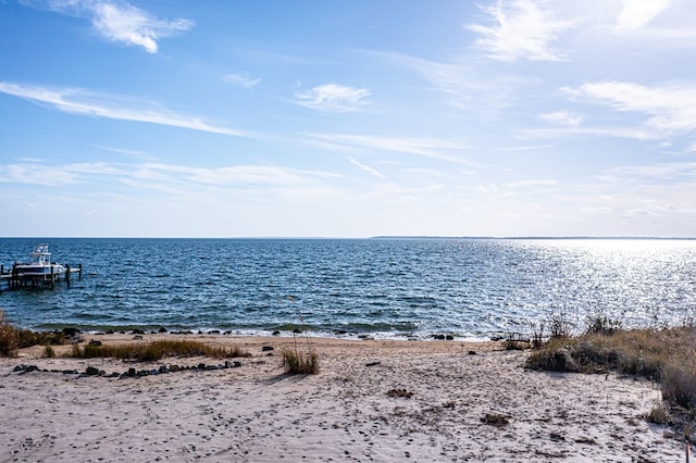 water view with a dock and a beach view