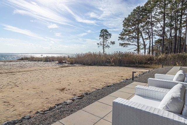 view of patio / terrace with a water view