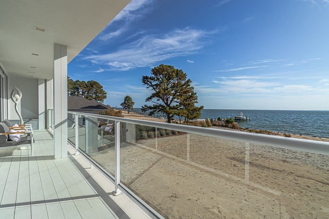 balcony featuring a water view