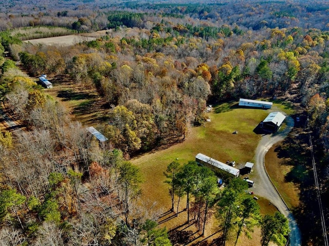 aerial view featuring a view of trees